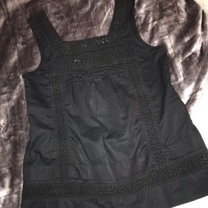 sleeveless black top